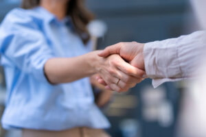 Business leaders shaking hands.