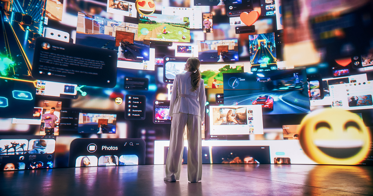 An adult female looking at various forms of digital content.