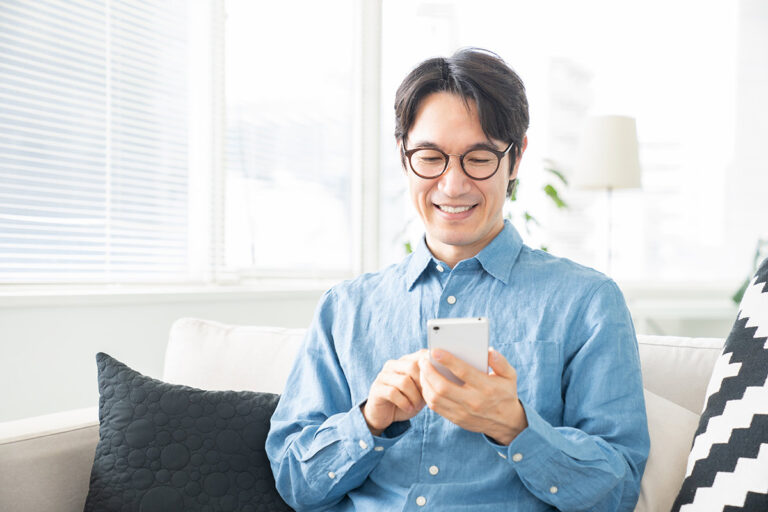 A man on his cell phone.